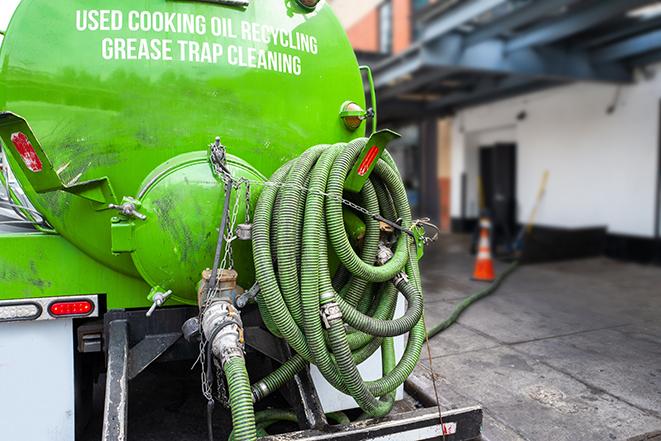 a large grease trap being pumped by a specialist in Aliquippa PA